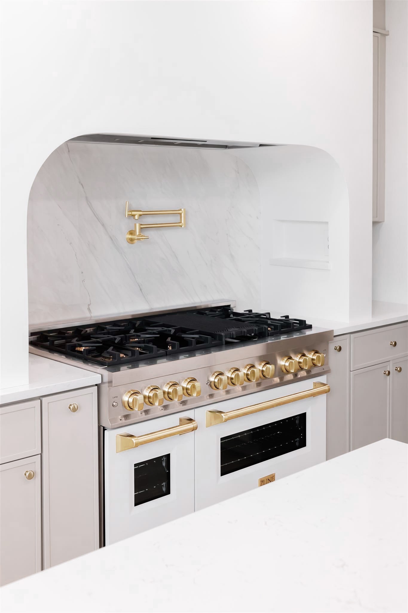 ZLINE Autograph Edition 48 in. 6.0 cu. ft. Legacy Dual Fuel Range with 7 Burner Gas Cooktop and 2 Electric Ovens in Stainless Steel and Champagne Bronze Accents (RAZ-48-CB)
