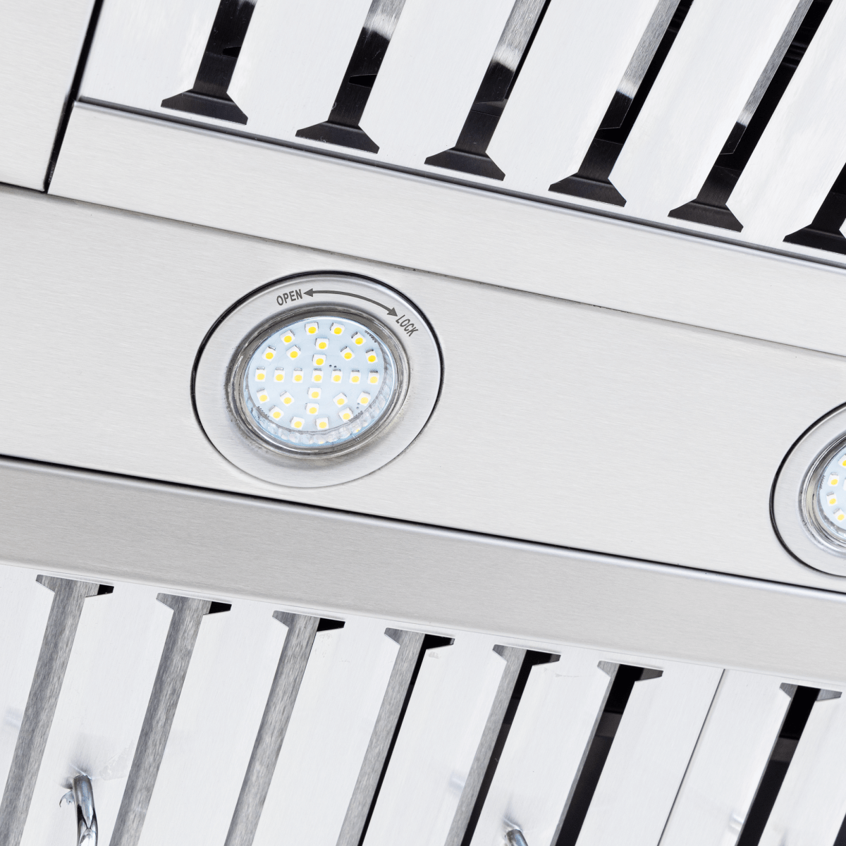 Close-up of LED lights, metal vents, LCD controls on Proline PLFI 755 Island Range Hood, 1100 CFM, ProlineRangeHoods.com.