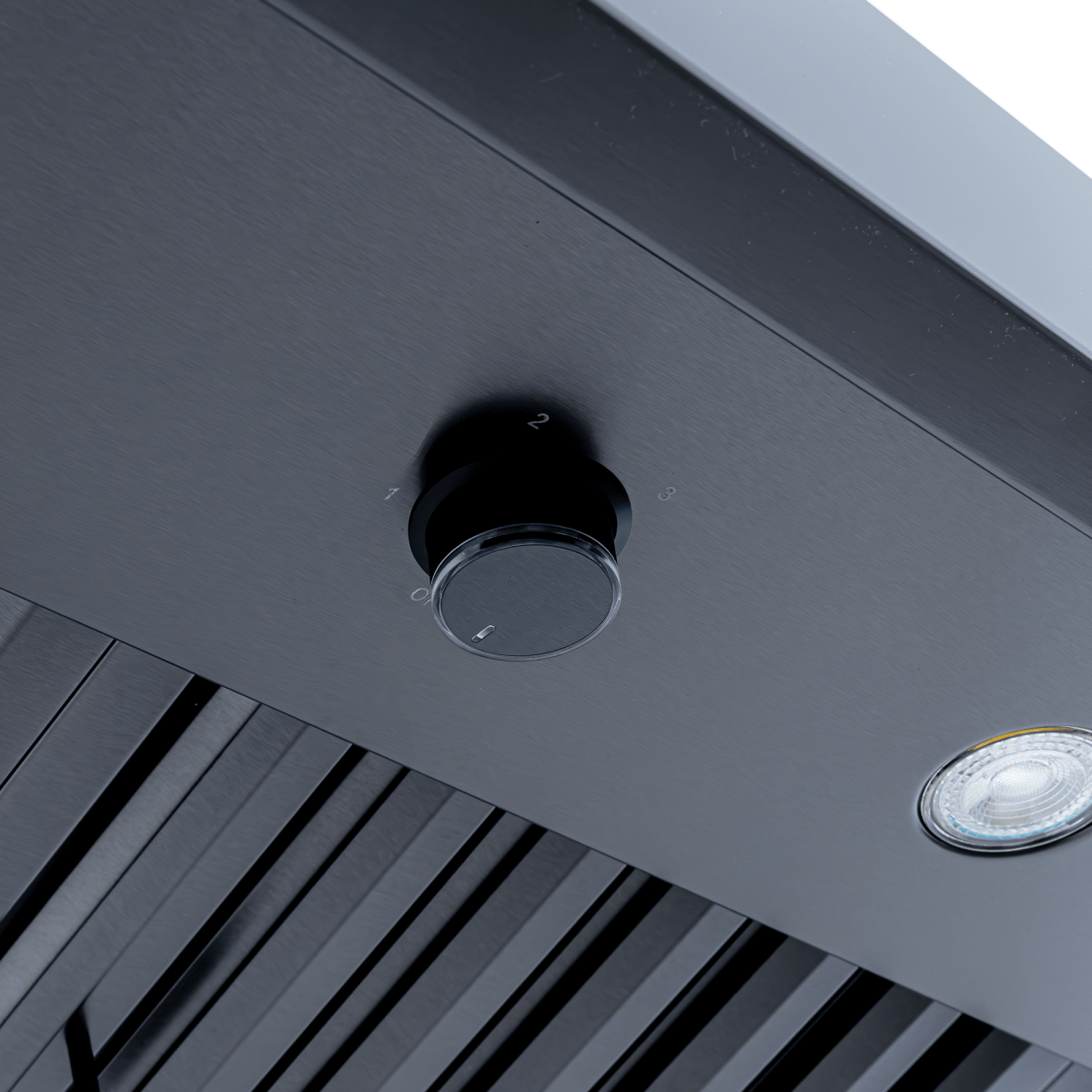 Close-up of control knob labeled 0-3 and small light on Proline PLJW 104 range hood. ProlineRangeHoods.com.