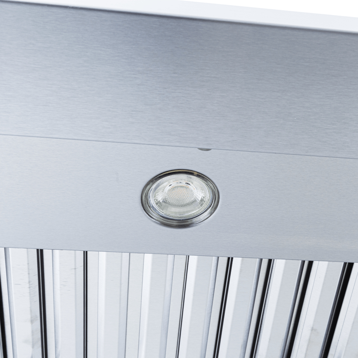 Close-up of Proline PLJW 121 under-cabinet range hood, round light, vertical slats, stainless steel. ProlineRangeHoods.com.