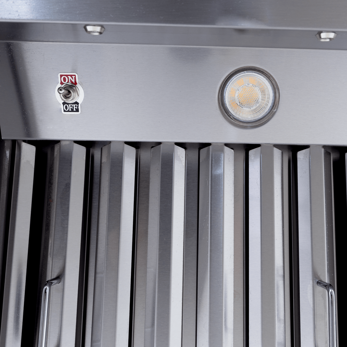 Close-up of Proline PLJW 109 wall-mounted stainless steel range hood, ON/OFF switch, from ProlineRangeHoods.com.