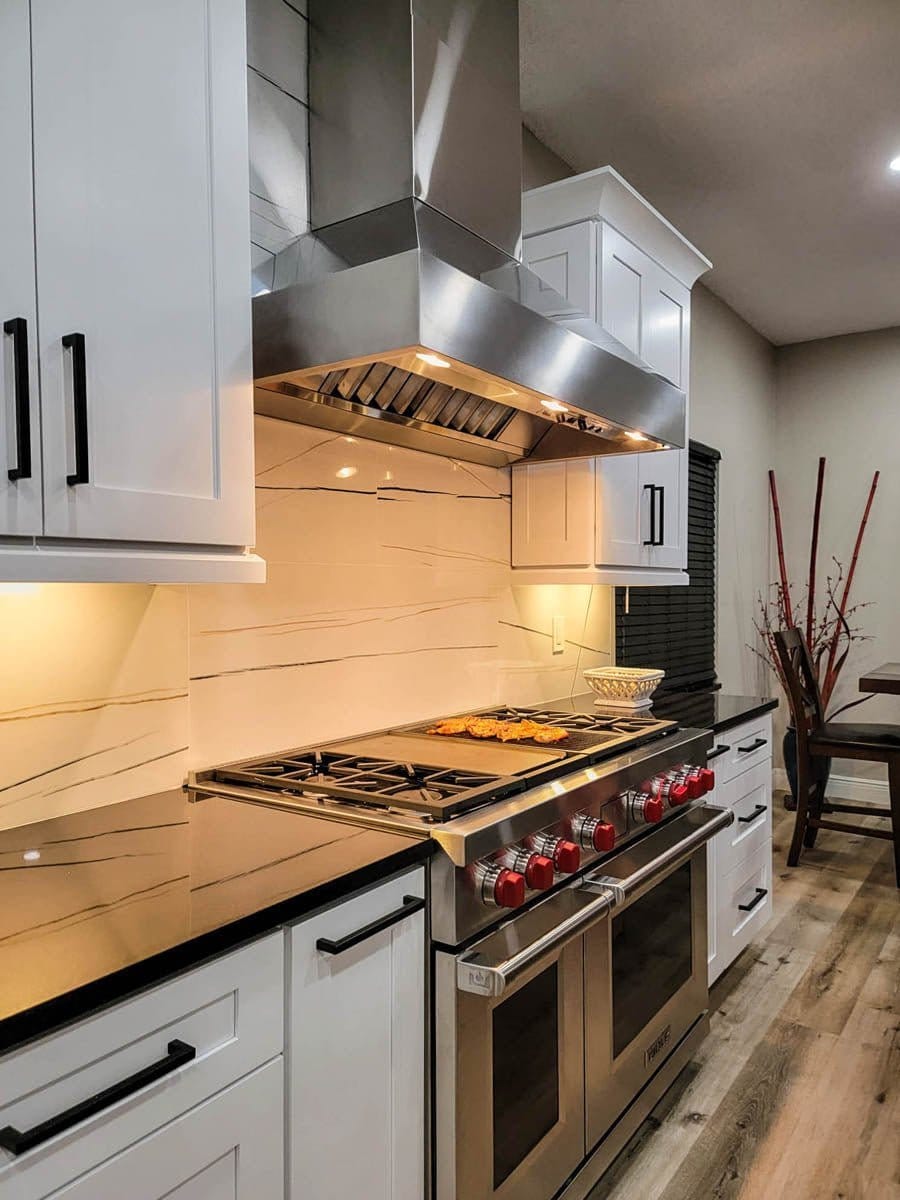 Proline ProVWC Wall-Mounted Range Hood Installed in a Luxury Modern Kitchen