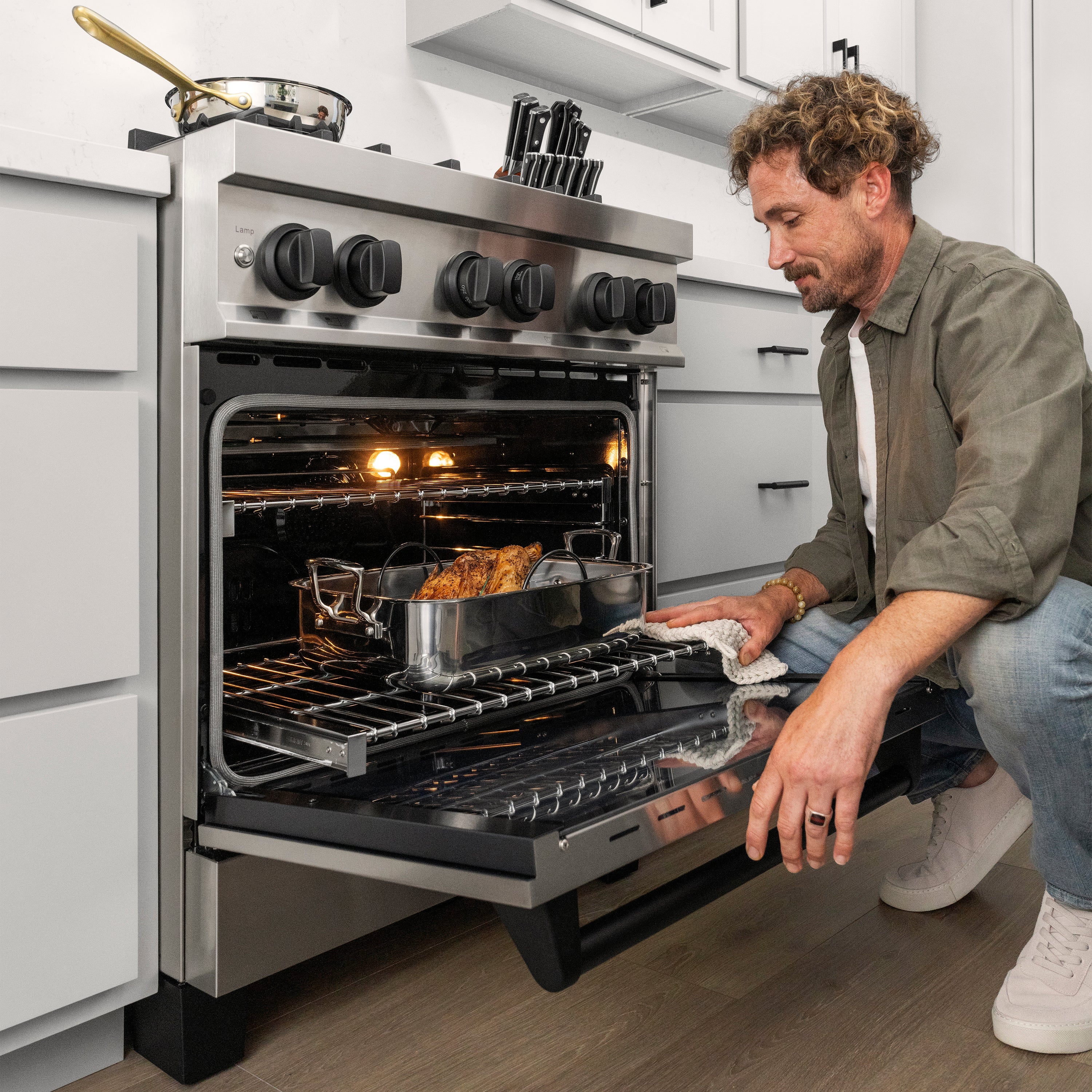 ZLINE Autograph Edition 30 in. 4.0 cu. ft. Legacy Dual Fuel Range with 4 Burner Gas Cooktop and Electric Convection Oven in Stainless Steel and Champagne Bronze Accents (RAZ-30-CB)
