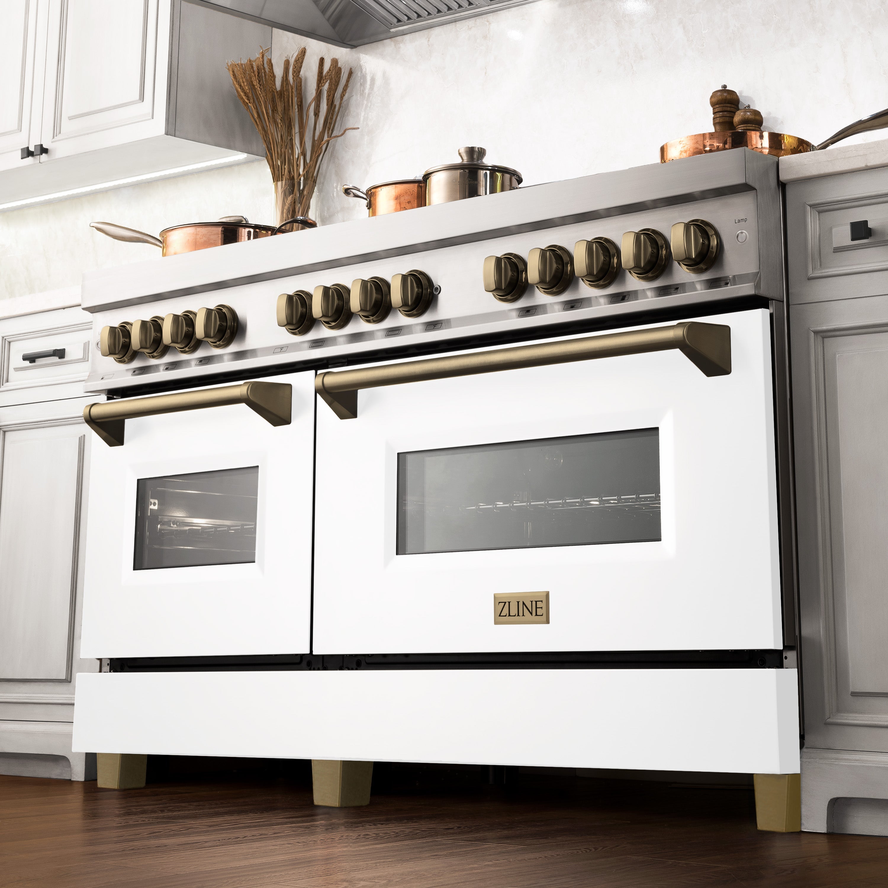 ZLINE Autograph Edition 60 in. 7.4 cu. ft. Legacy Dual Fuel Range with 9 Burner Gas Cooktop and 2 Electric Convection Ovens in Stainless Steel and Champagne Bronze Accents (RAZ-60-CB)
