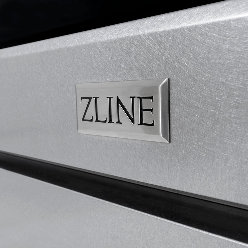 ZLINE dual fuel range and matching wall-mount range hood in a modern Salt Lake City kitchen