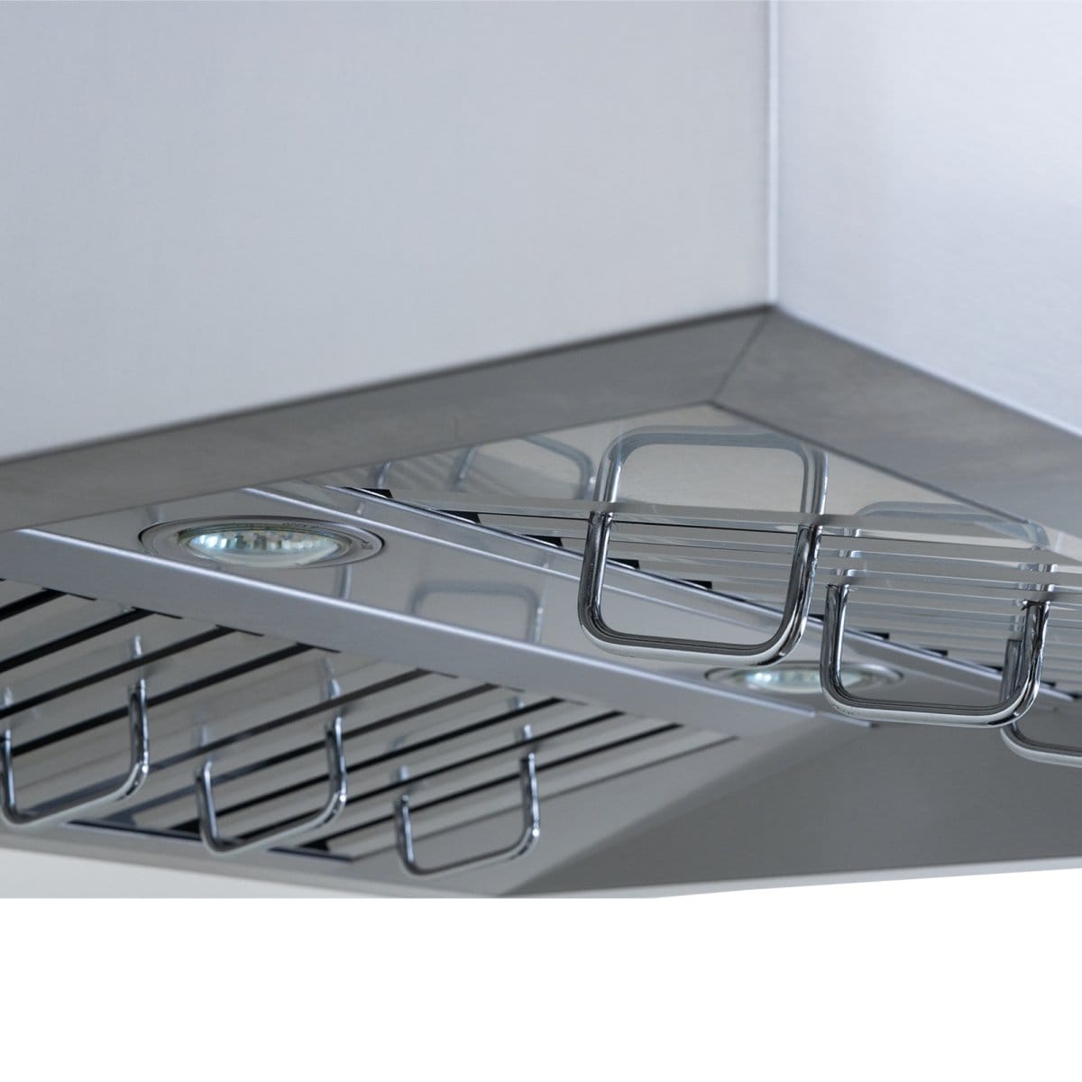 Close-up of the Proline PLFI 755 Island Range Hood by ProlineRangeHoods.com, featuring stainless steel, LCD touch controls, integrated lighting, and metal grease filters for efficient ventilation with an outdoor-rated finish option.