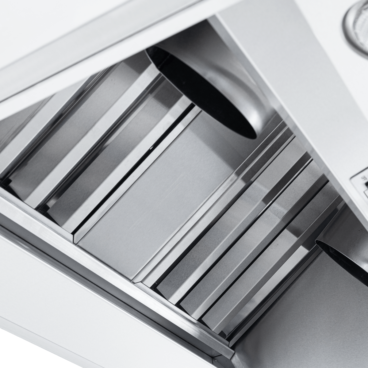 Close-up of ProVW under-cabinet range hood filter, sleek stainless steel, at ProlineRangeHoods.com, for modern kitchens.