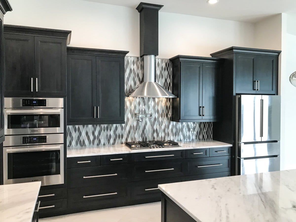 Proline Vector - Ducted Wall-Mounted Range Hood Installed in a Luxury Modern Kitchen