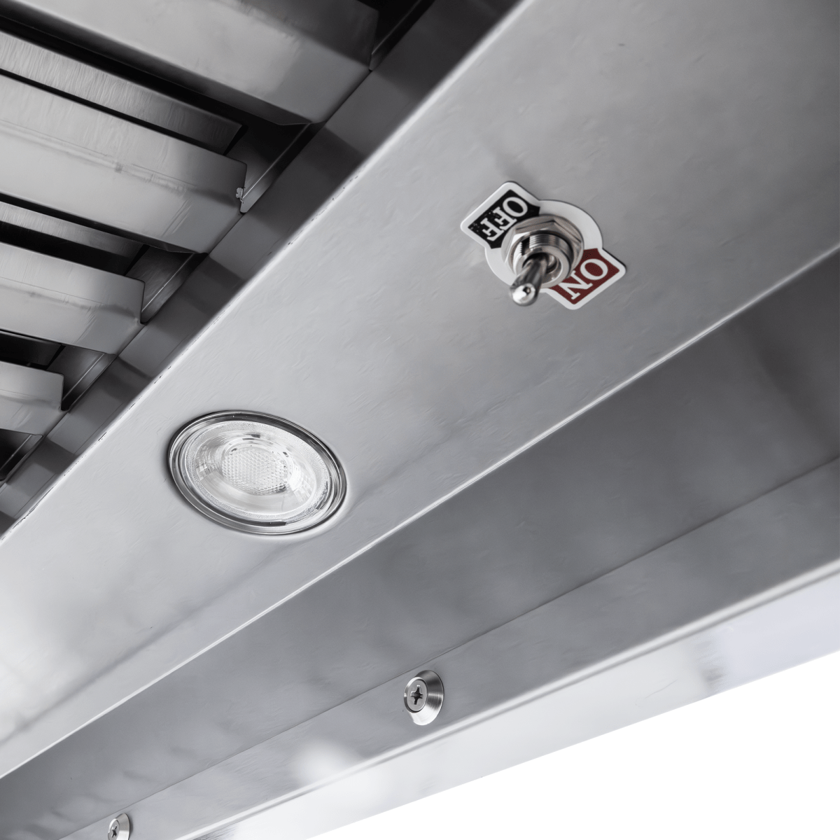 Close-up of Proline PLJW 109 wall-mounted range hood, switch panel and light. ProlineRangeHoods.com.