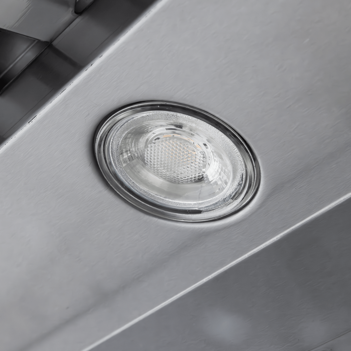 Close-up of LED light on Proline PLJW 109 Range Hood, stainless finish, 1000/2000 CFM, at ProlineRangeHoods.com.